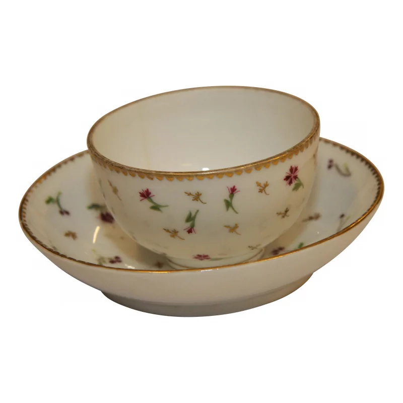 Tasse et sa sous-tasse Vieux Nyon décor myosotis. 18ème siècle - Moinat - Porcelaine