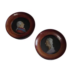 Pair of wooden medallion with ceramic profiles of Louis …