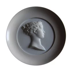 porcelain medallion representing the left profile of a …