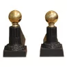 Ein Paar Bügelböcke aus Gusseisen und Bronze - Moinat - Kaminböcke