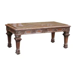 living room table in patinated carved wood with beige marble.