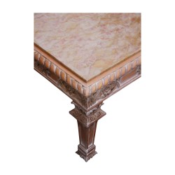 living room table in patinated carved wood with beige marble.