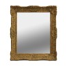 Miroir avec un cadre en bois doré sculpté. - Moinat - Glaces, Miroirs