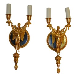 Paire d appliques Empire en bronze doré avec 2 lumières.