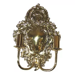 2 Louis XV sconces in brass with 2 lights. (310sfr each).
