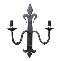 wrought iron wall lamp with 2 lights.