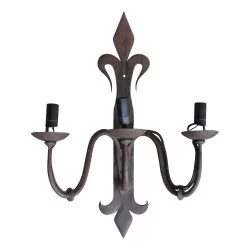 wrought iron wall lamp with 3 lights.