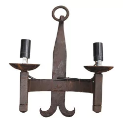 wrought iron wall lamp with 2 lights.