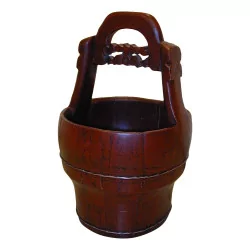 Red lacquered wooden water bucket.