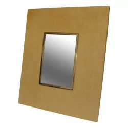 Photo frame in ivory-coloured leather.