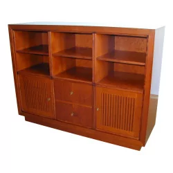 Cherry wood bookcase with modular element.
