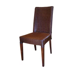 “Edward” chair in brown stained woven rattan.