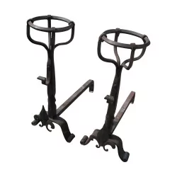 Pair of “Lys” large model andirons, in wrought iron.