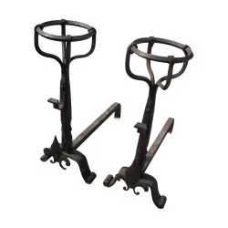 Pair of small model “Lys” andirons, in wrought iron.