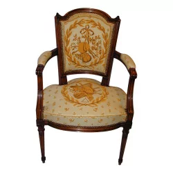 Louis XVI armchair in beech, antique walnut patina. Finished