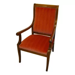 Louis-Philippe armchair in walnut, covered in red velvet.