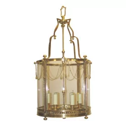 Large round bronze lantern with 6 lights.