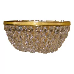 ceiling lamp in brass and crystals.