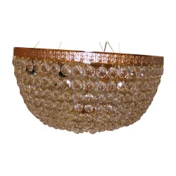 ceiling lamp in brass and crystals.