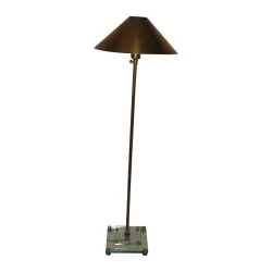 brass floor lamp adjustable in height.