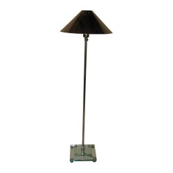 Lampadaire réglable en hauteur chromé.