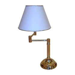 Articulated lamp in brass.