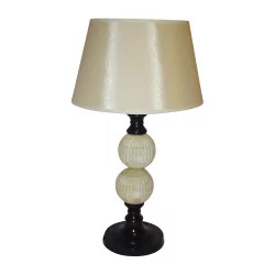 “Poros” lamp with beige shade.