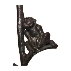 Lampe “Singe” en bronze patiné avec abat-jour pince.