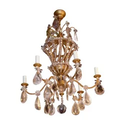 1930s style chandelier in gilded iron with leaf and crystals …