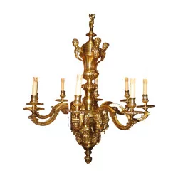 Louis XIV style chandelier in chased bronze with 8 lights.