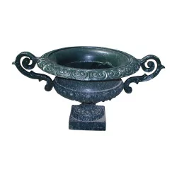 Urn with handles painted green.