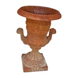 MEDICIS cast iron vase in rust color with handles.