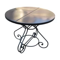Pair of consoles, forming a round table in black wrought iron.