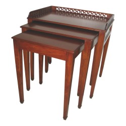 Set of cherry wood nesting tables with antique patina.