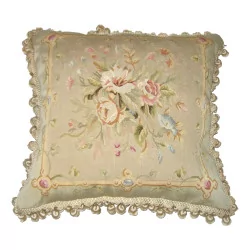 Aubusson and silk cushion with floral pattern.