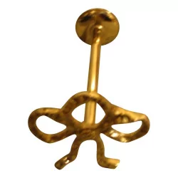 “Knot” hook in gilded brass.