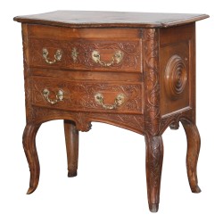 Chest of drawers in richly carved oak and walnut. France (East), Late …