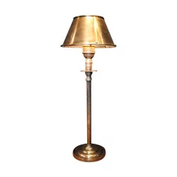 nickel-plated bedside lamp with lampshade.