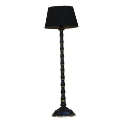 black and gold metal lamp with black cotton lampshade.