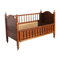 child's bed - baby in walnut on small brass wheels, …