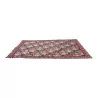 Tapis aux petits points décor floral coloris rouge vert sur - Moinat - Tapis