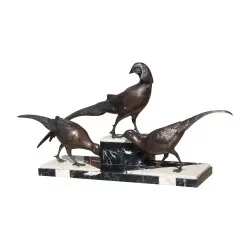 Bronze de 3 faisans sur socle en marbre noir et blanc.
