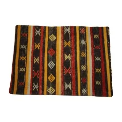 Rissen decorative cushion cover with feather interior.