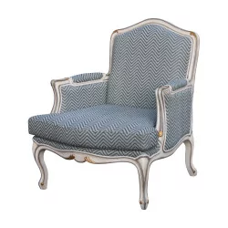 把路易十五风格的扶手椅，上面覆盖着蓝色人字纹织物……