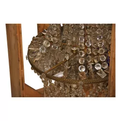 Large basket chandelier in bronze and crystals in the process of …