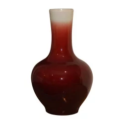 Beef blood vase with straight white porcelain neck.