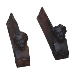 Pair of cast iron \"Faces\" andirons. 20th century