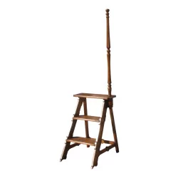 Library stepladder in turned and carved cherry wood.