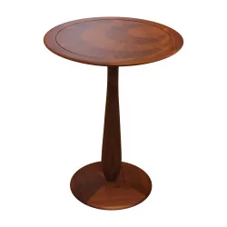 “Cerchio” pedestal table in round walnut wood.