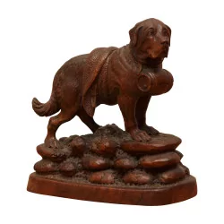 Brienzer Hundeskulptur aus geschnitztem Holz, die einen …